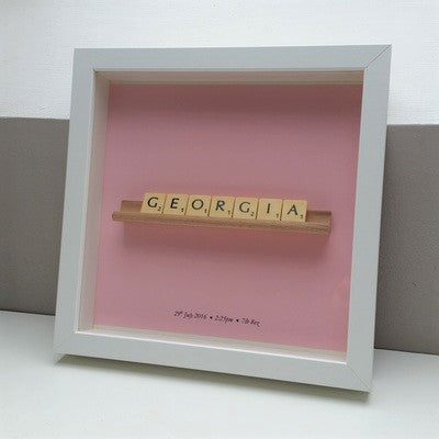 Personalised pink Scrabble name frame, a name in cream vintage tiles on a vintage wooden scrabble rack