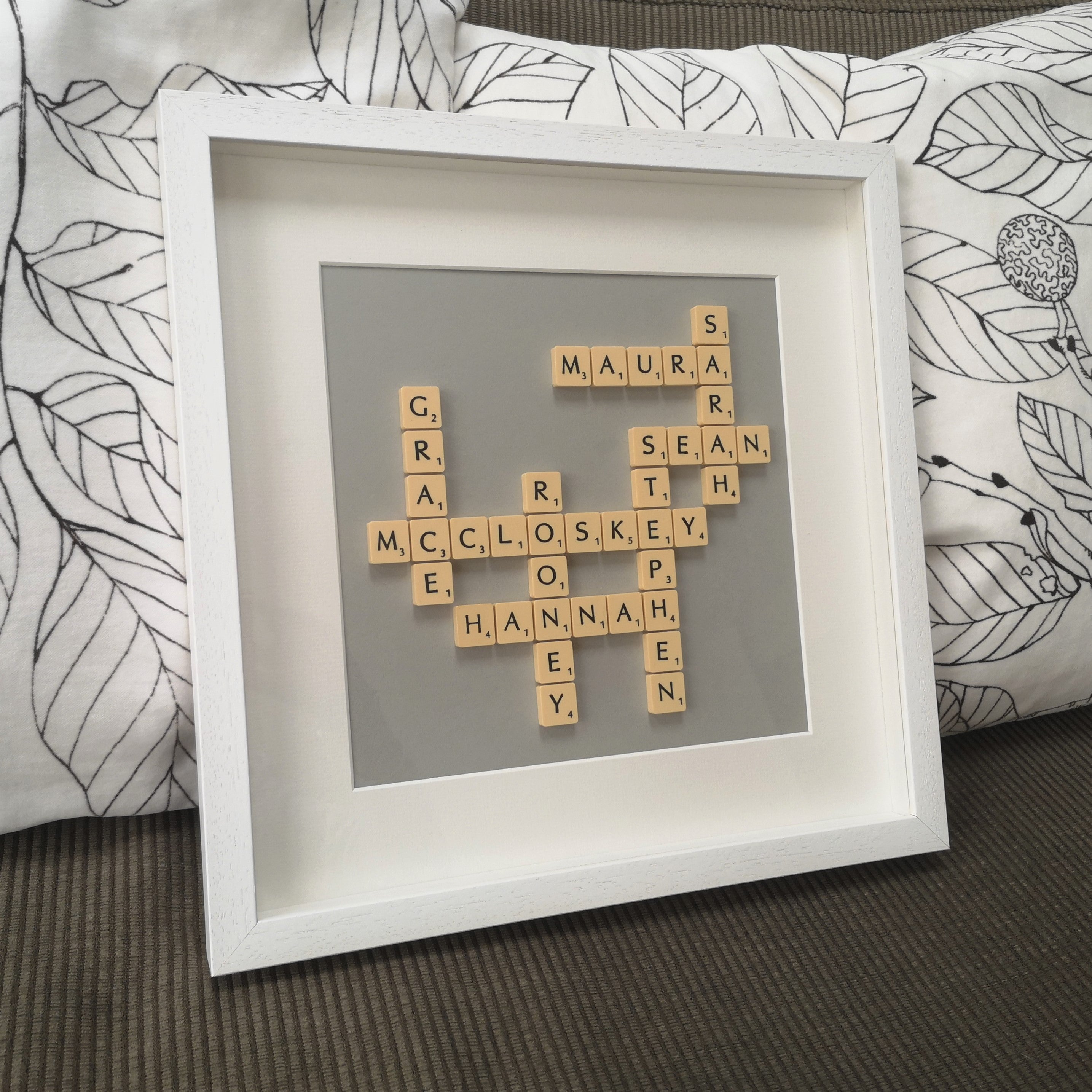 Family Names in vintage cream scrabble tiles on grey background in a handmade white 30x30cm deep box wooden frame