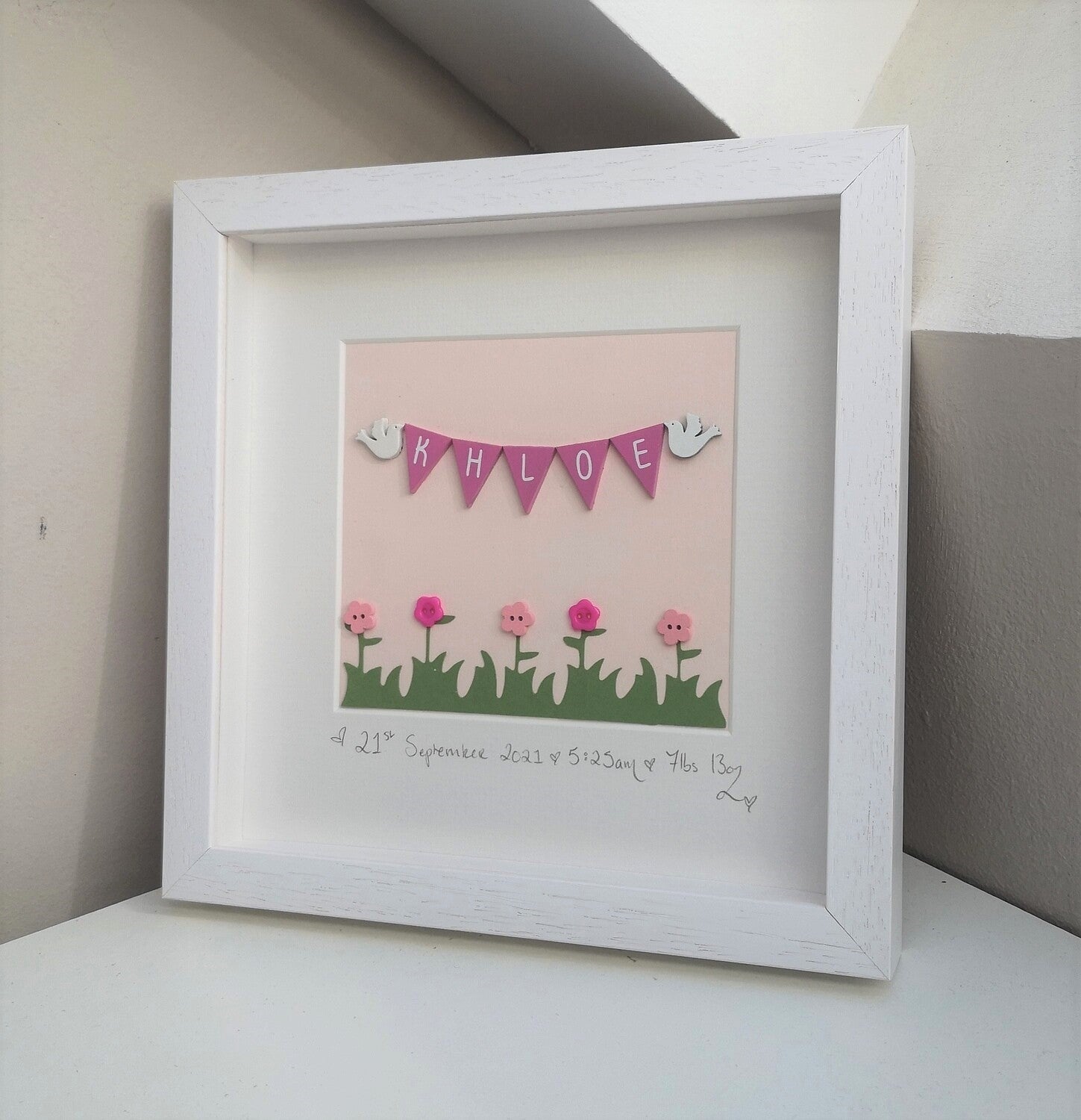 A handpainted pastel pink wooden bunting and doves with button flowers 5 letter frame