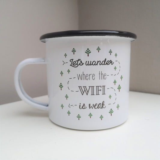 A White enamel mug with a black rim with the following on the front - 'Let's wander where the WIFI is weak' and lots of little trees that are upside down wifi signals