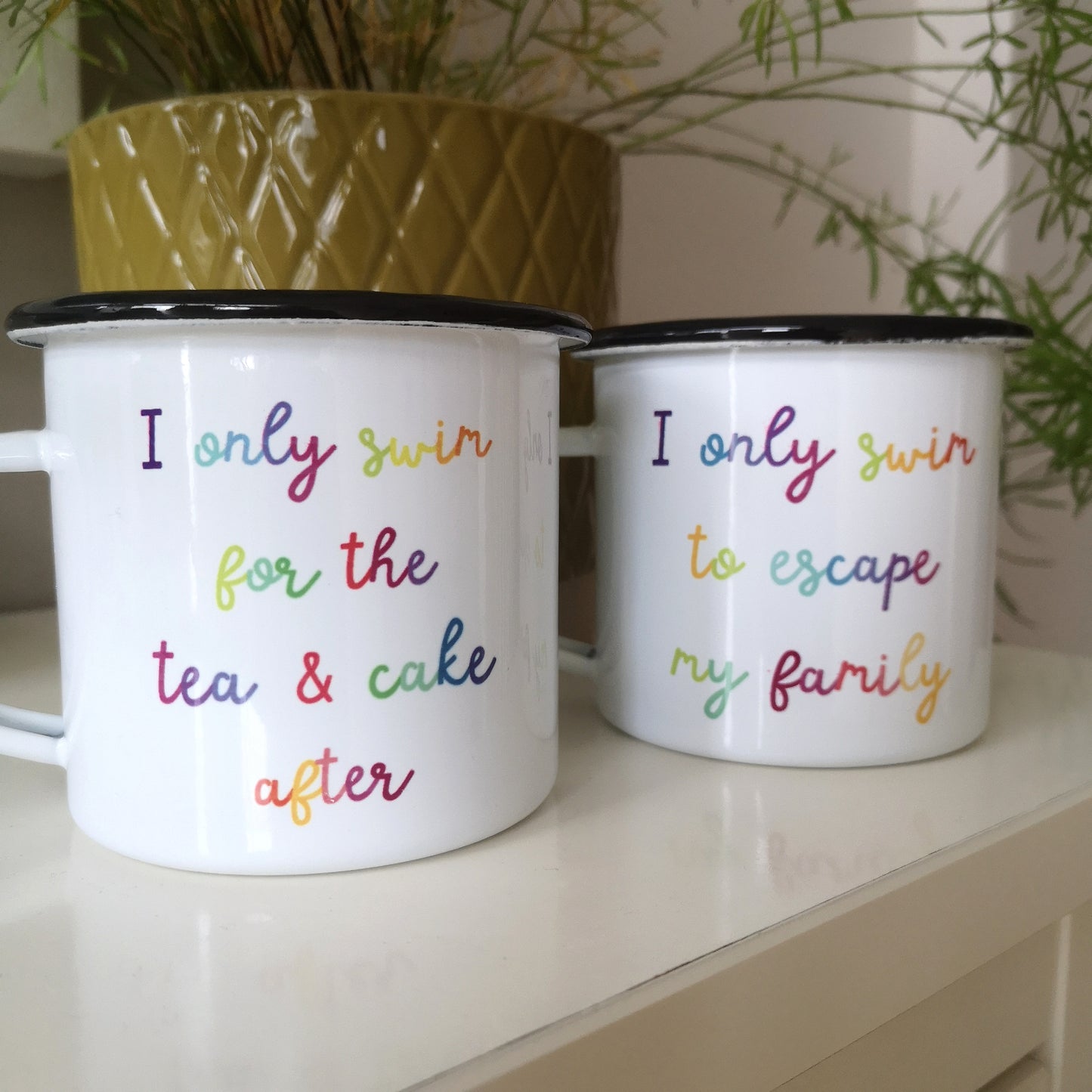 A steel enamel cup for your after-swim tipples, with a choice of 3 confessions in colourful rainbow text:  I only swim for the tea & cake after.  I only swim for the coffee & cake after.  I only swim to escape my family.