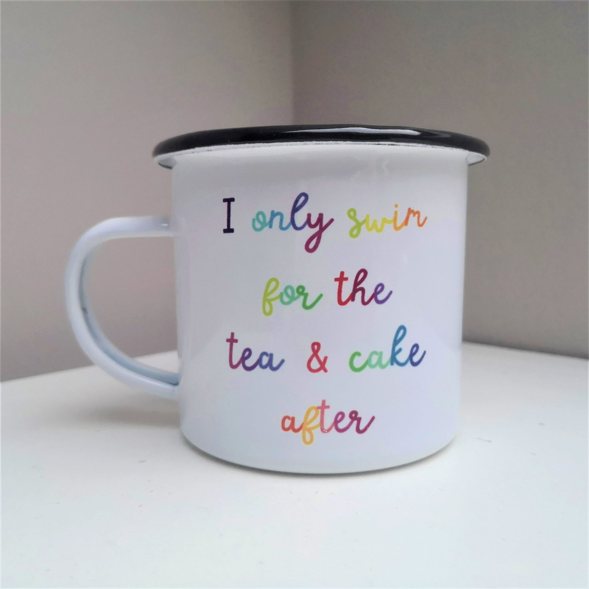 A steel enamel cup for your after-swim tipples, with a choice of 3 confessions in colourful rainbow text.  This mug has the following excuse - I only swim for the tea & cake after.  