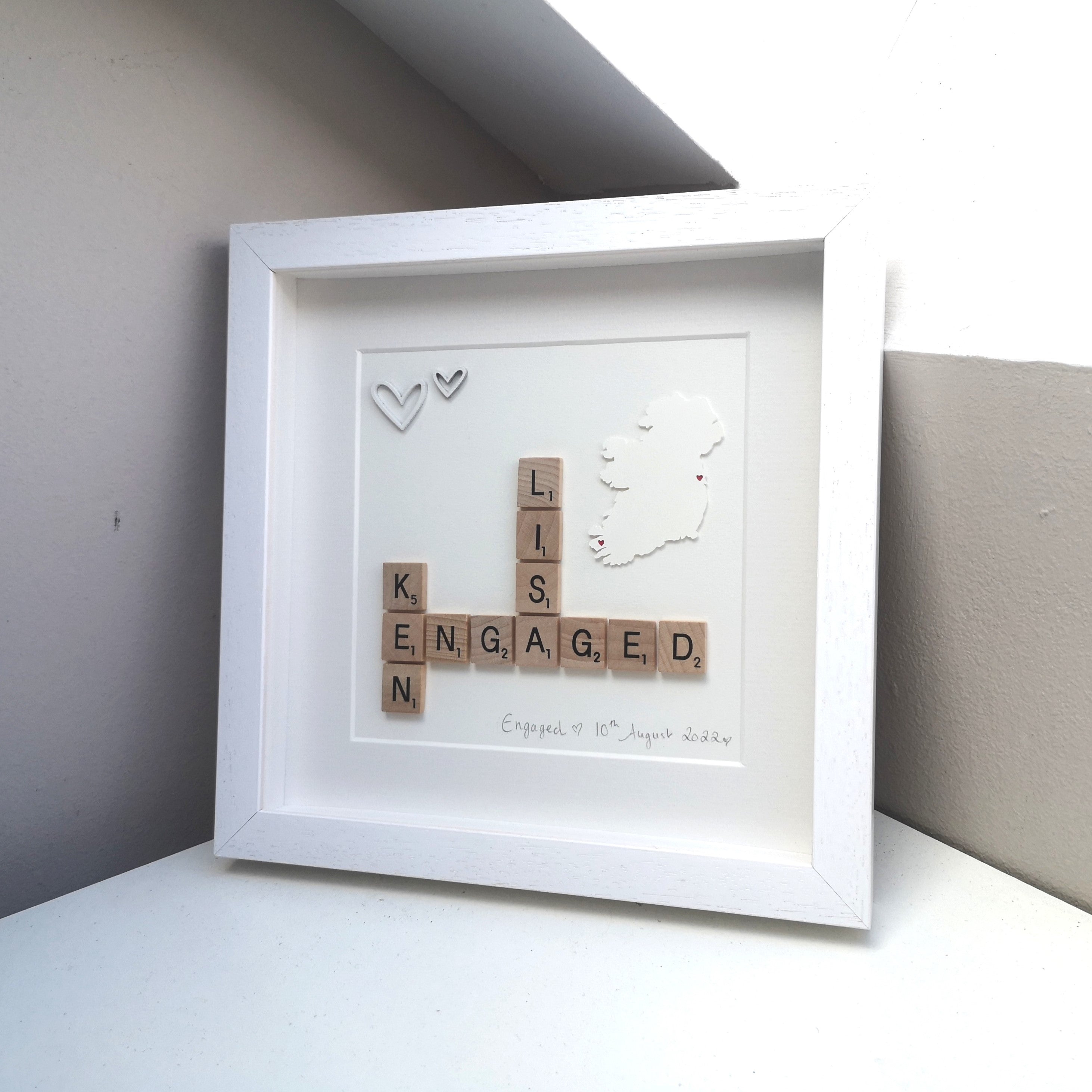 Personalised Engagement Scrabble name frame with 2 names, white wooden hearts and papercut Ireland with hearts cutouts