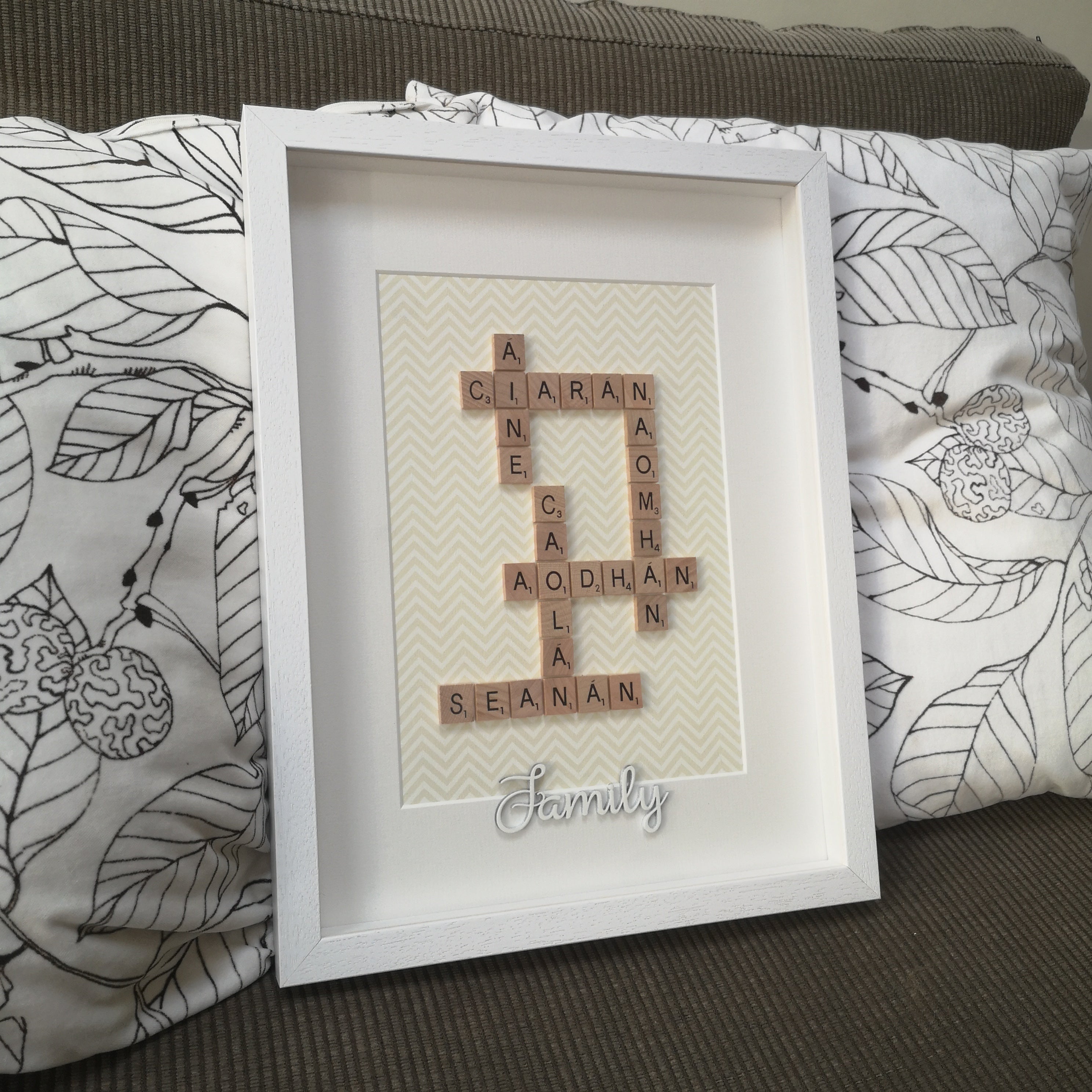 Personalised Family Scrabble name Frame with 6 names and wooden FAMILY on a yellow chevron background